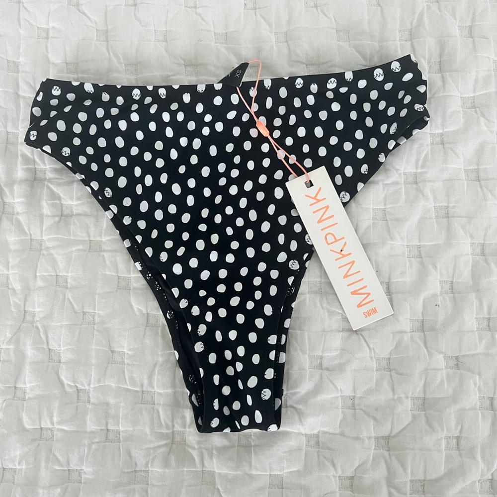 High waisted, bikini bottoms, never worn tags are still on perfect condition